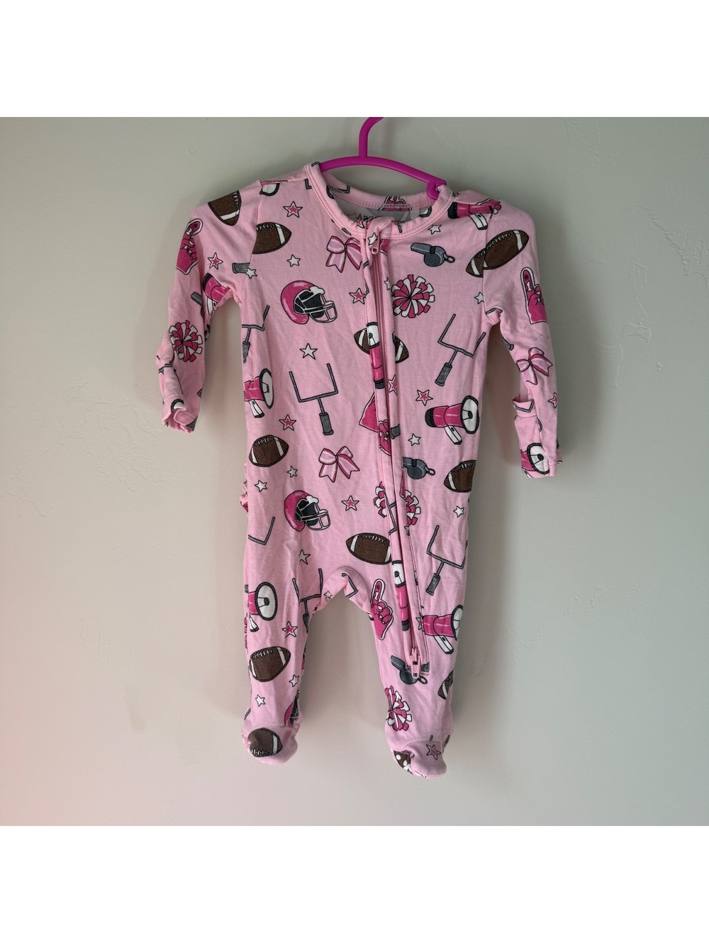 Pink football Ruffle Sleeper | angel dear NB